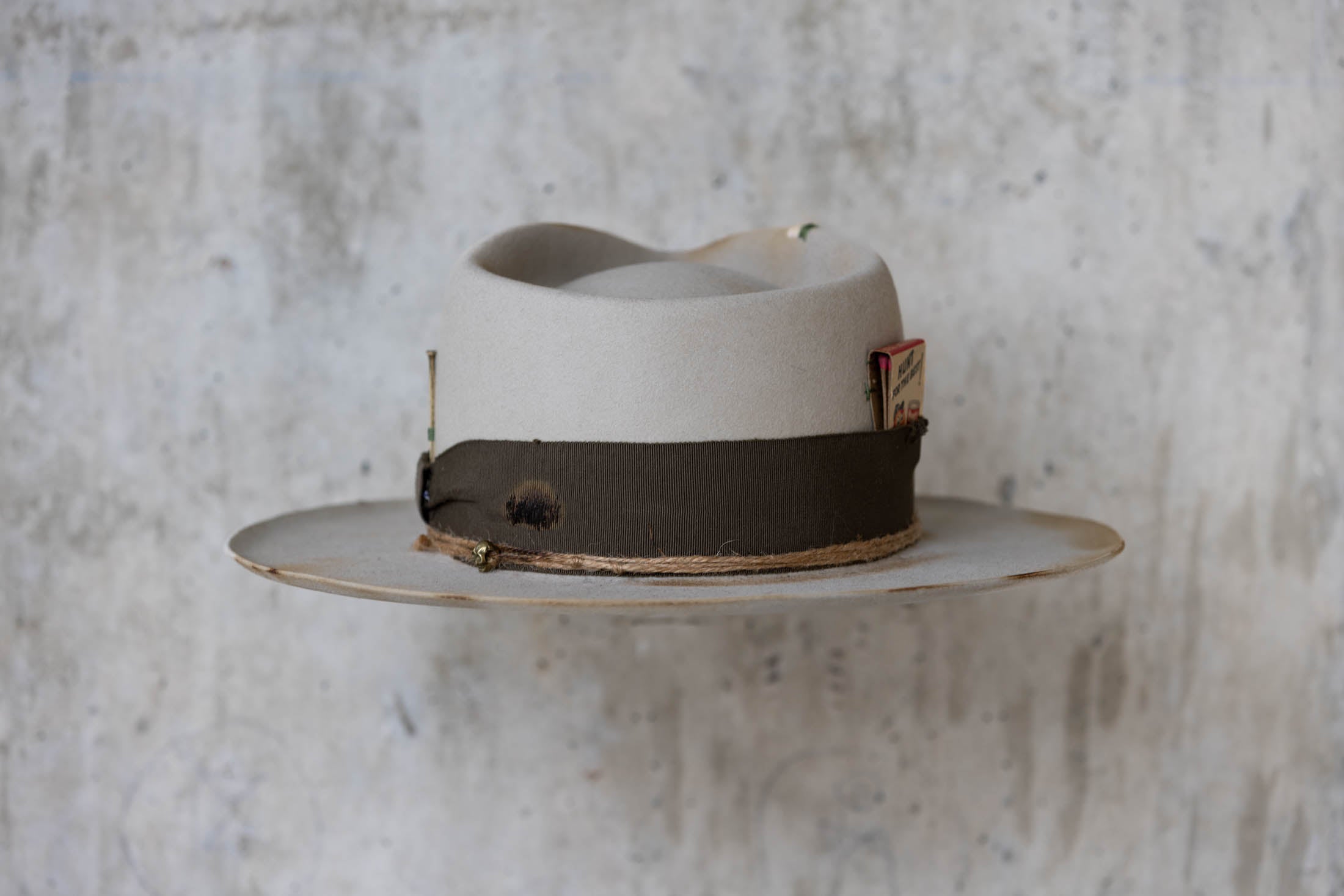 Silverbelly distressed beaver felt hat with teardrop crown and green band back side