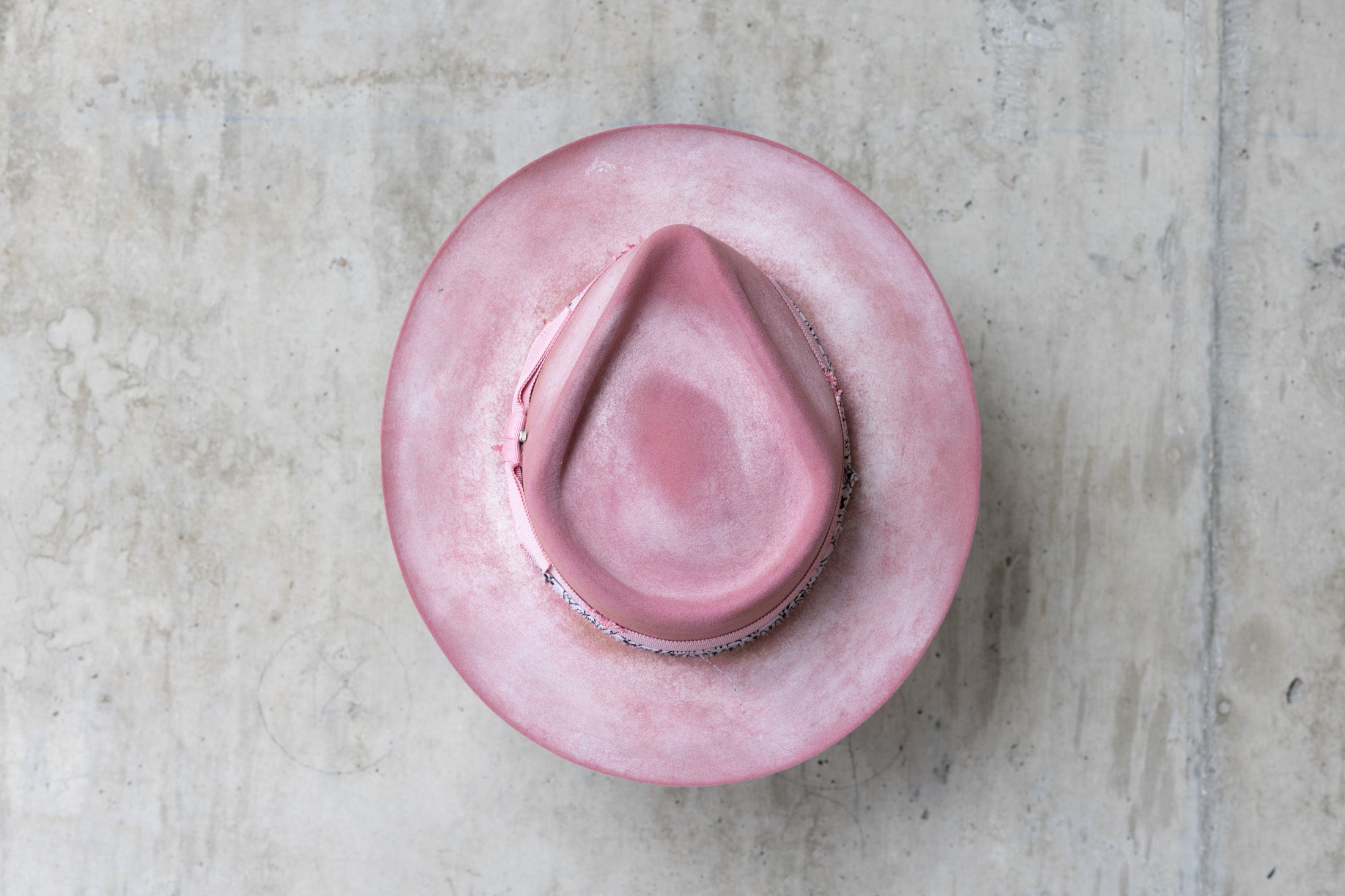 pink rabbit beaver felt distressed hat with a fedora teardrop crown and flat brim for men and women top