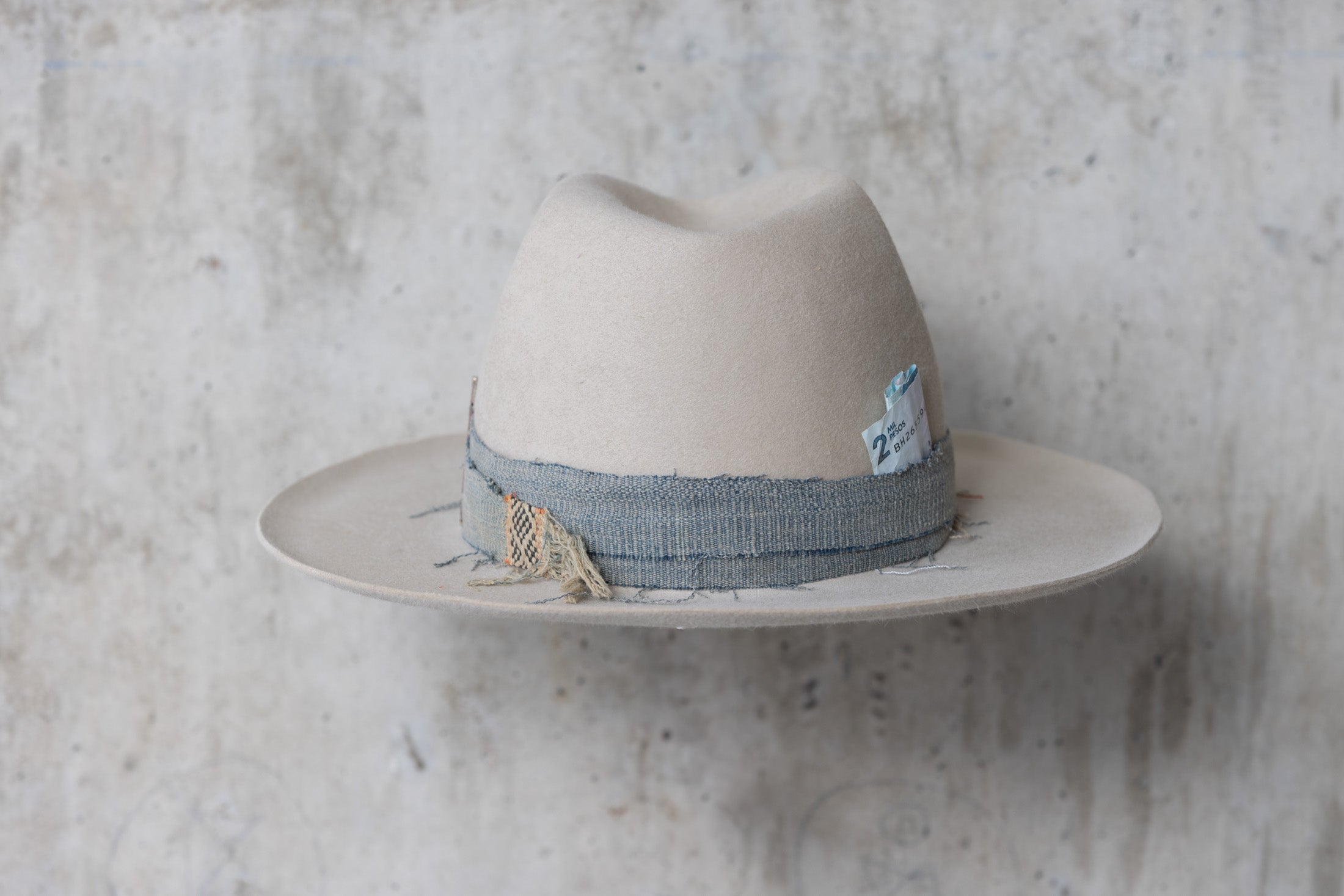 A custom beige wide brimmed beaver felt western fedora cowboy hat for men and women back