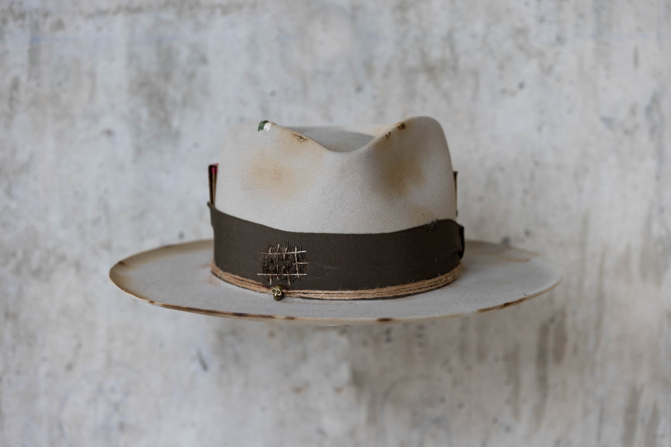 Silverbelly distressed beaver felt hat with teardrop crown and green band front