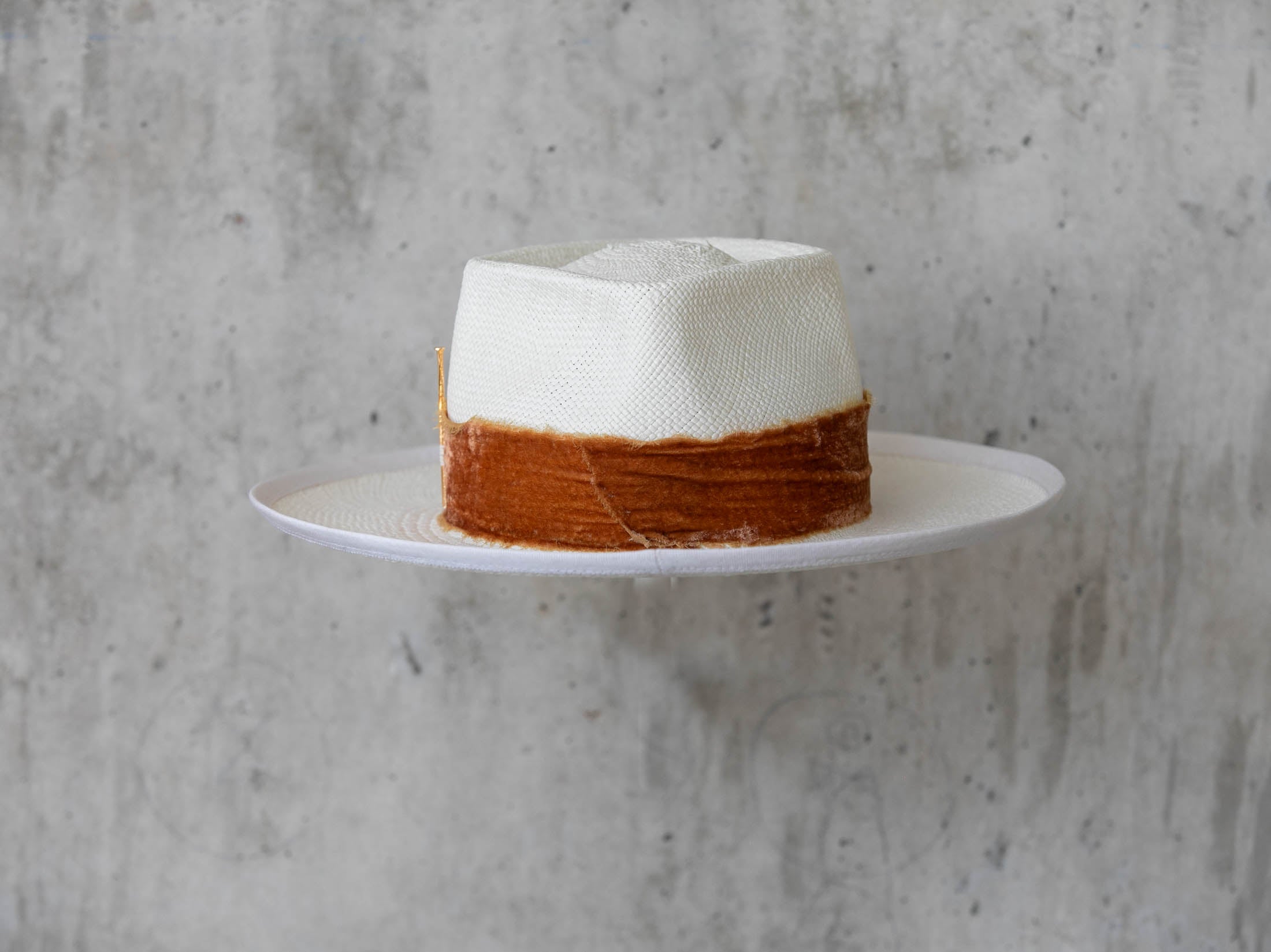 white Panama straw hat for wearing on a beach vacation for men and women back